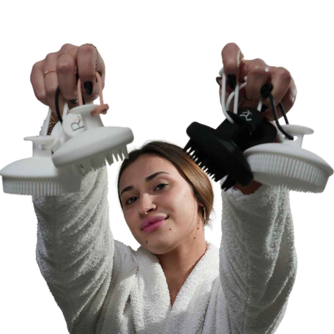 Model holding all Raqiia Brushes
