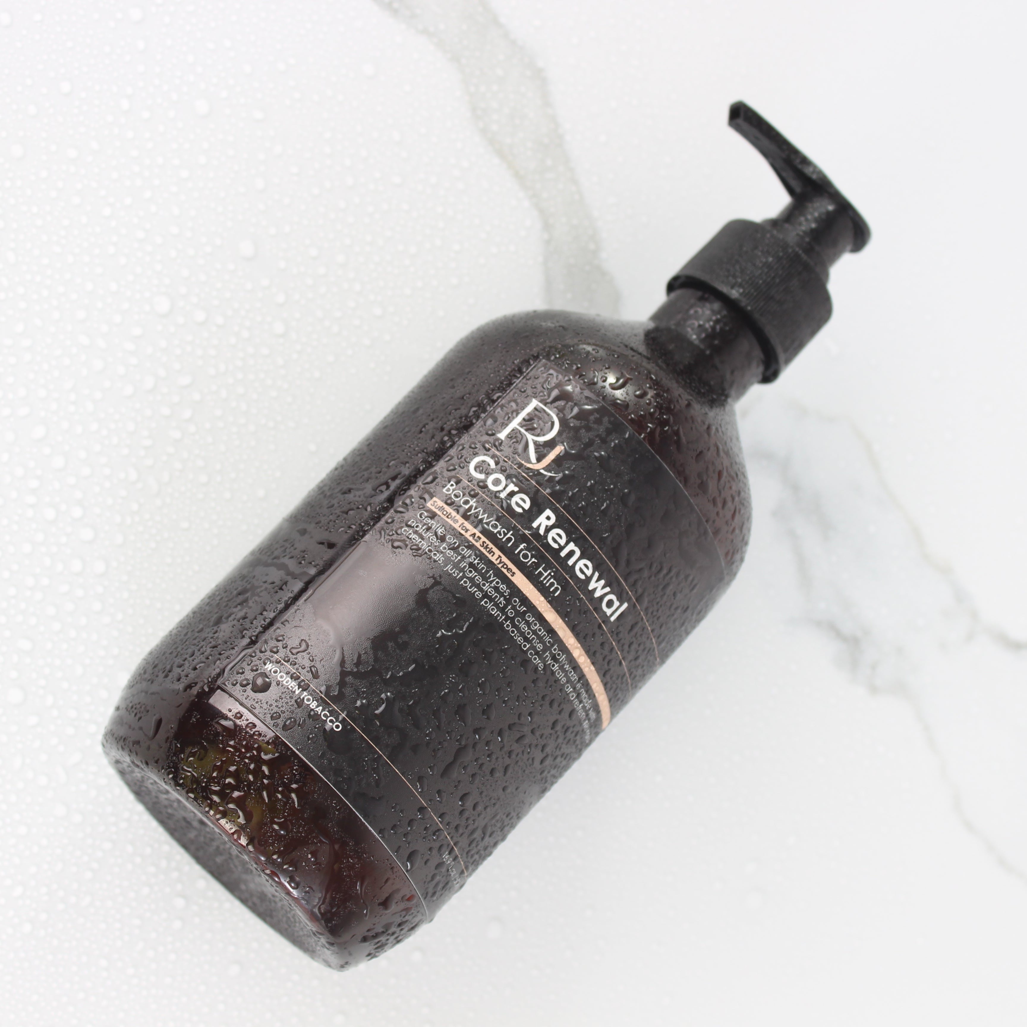 Raqiia Core Renewal Bodywash on white marble