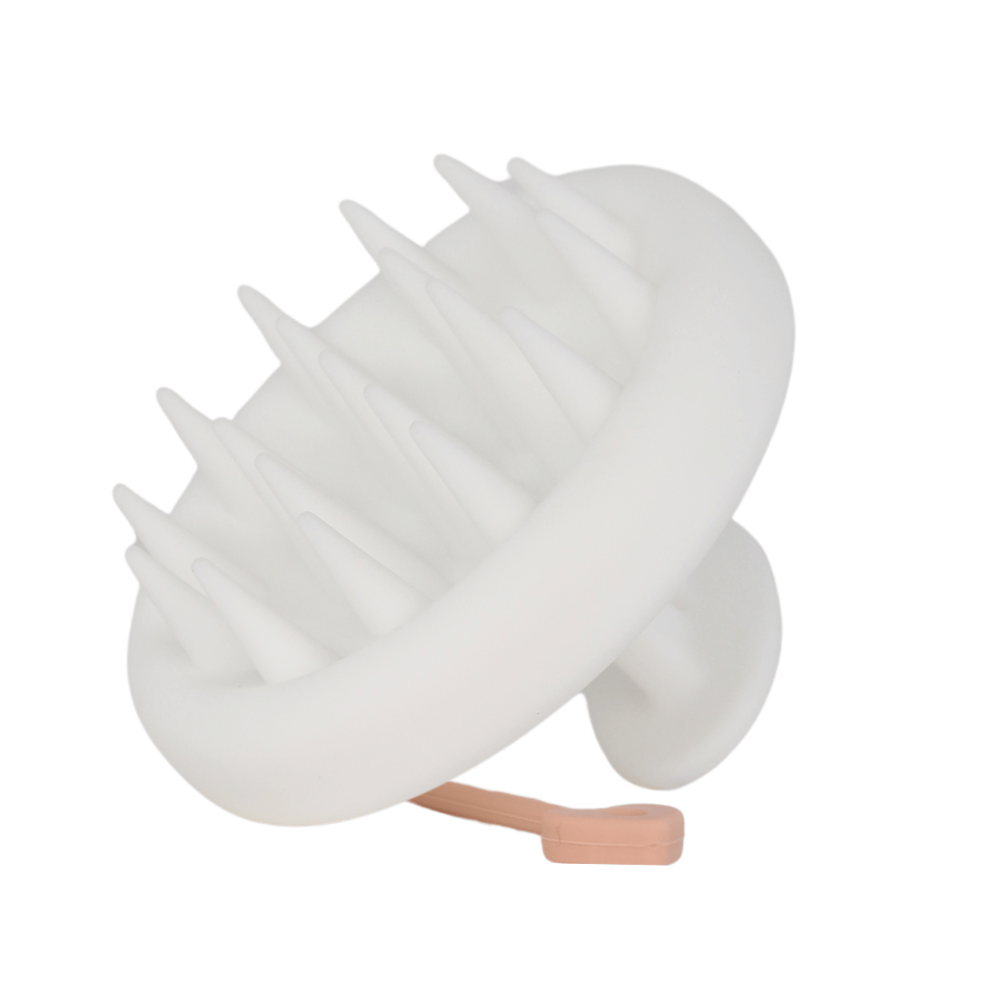 White Raqiia Scalp Massager with Rosegold Raqiia Strap