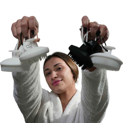 Model holding all Raqiia Brushes